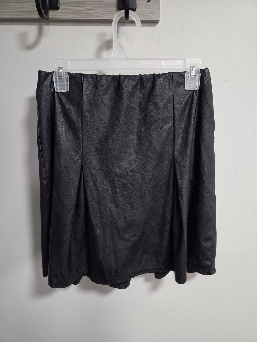 Cute Vintage black faux leather mini skirt by Messini in size Medium.